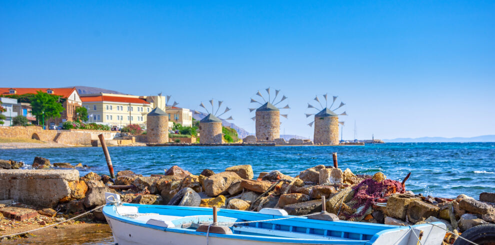 Old windmills by the beach, Chios island, Greece.